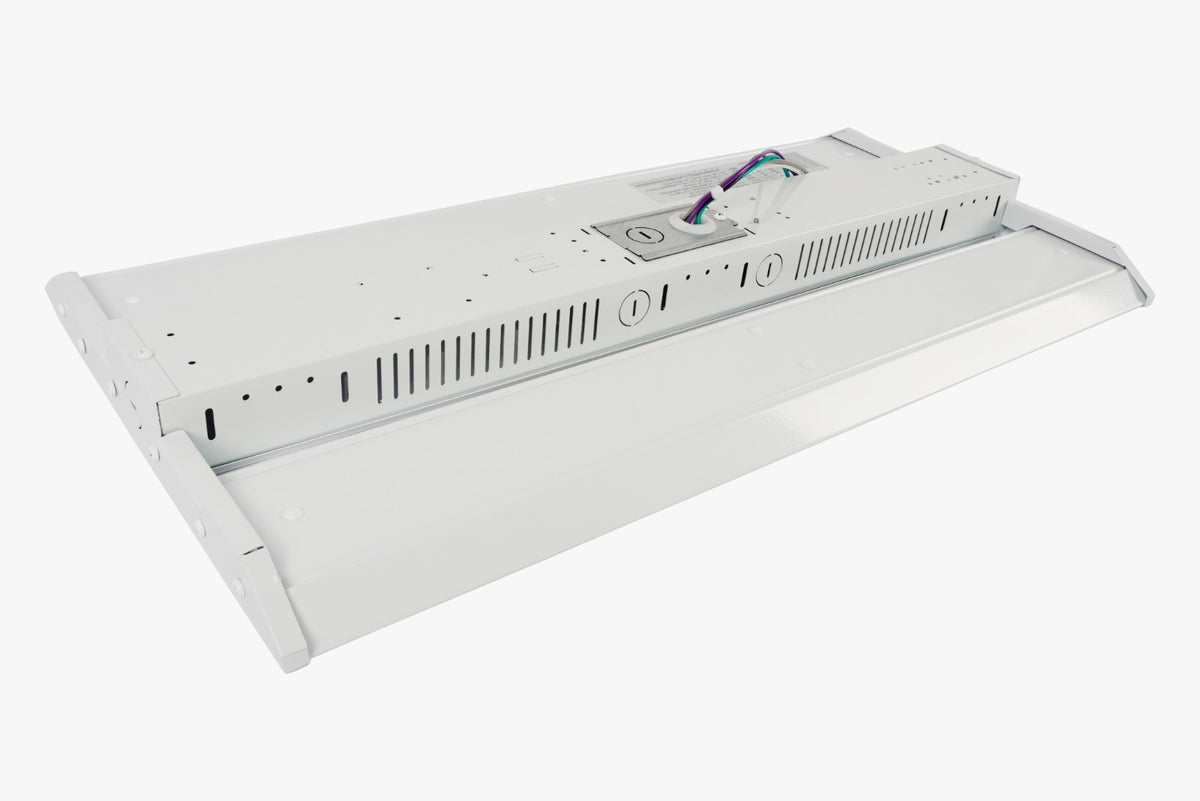 Rear angled view of linear LED high bay with driver housing and connection wires