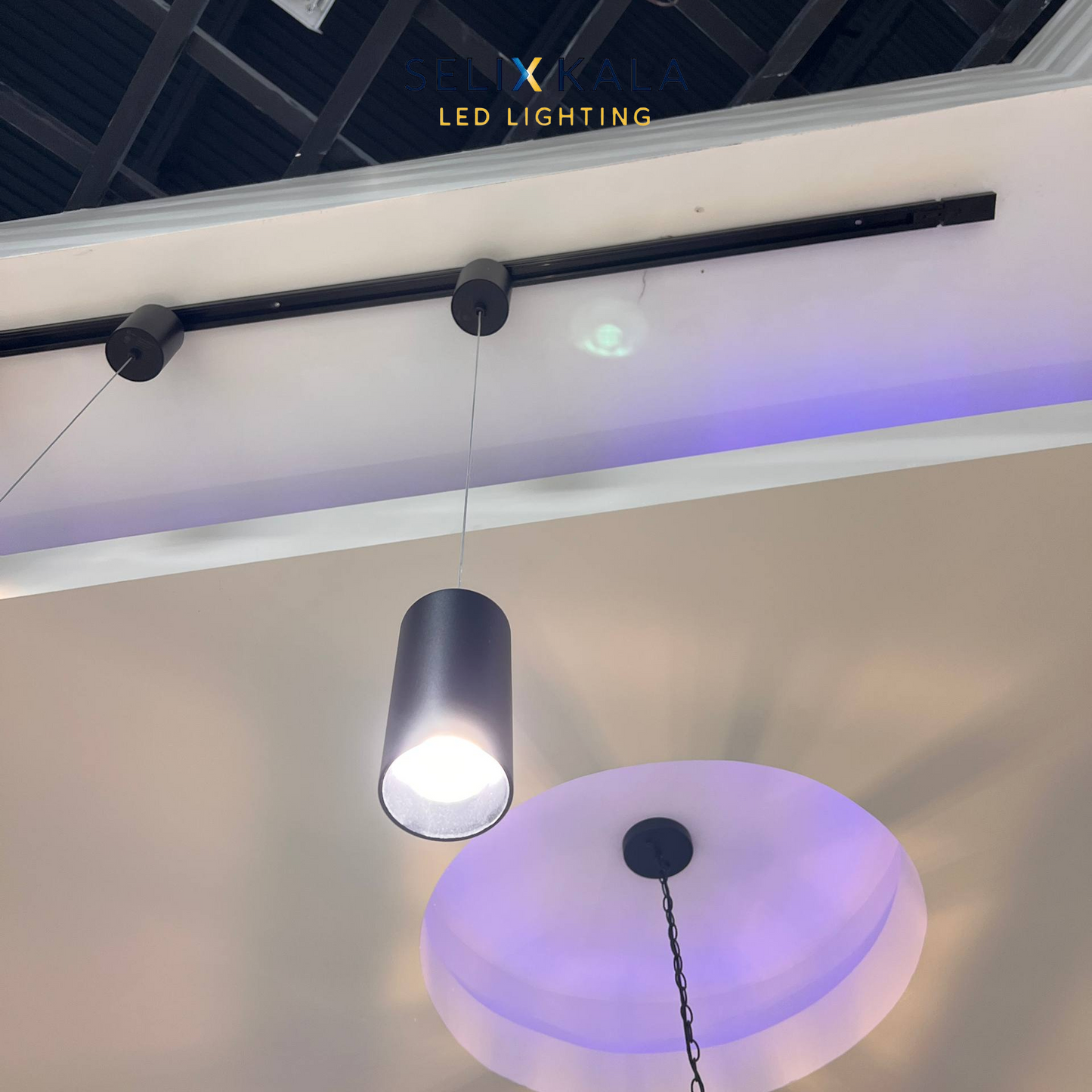 Ceiling with LED lighting fixtures and track lighting system.